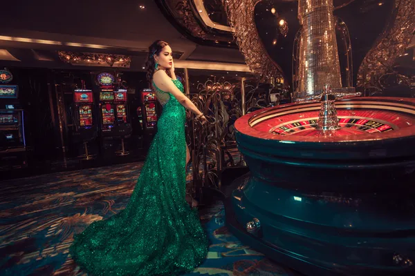 D63 Jackpot Slots — Spin for massive rewards A dramatic shot of winning sevens landing on a slot reel surrounded by shining gold coins, symbolizing big wins.